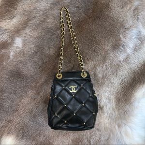 Black and gold purse with adjustable strap